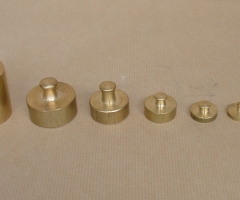 Bronze weights for balance scale.