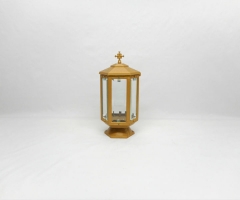 Six-sided aluminum cemetery candle.